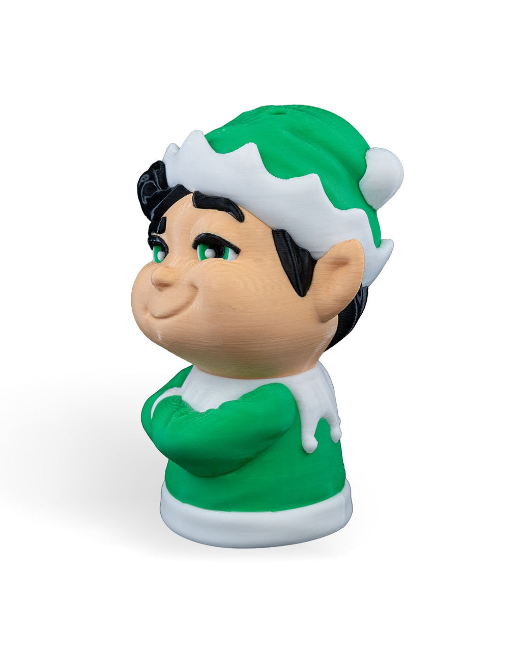 Christmas elf ornament in side profile showing the green hat, pom-pom and pointed ear, on a white background