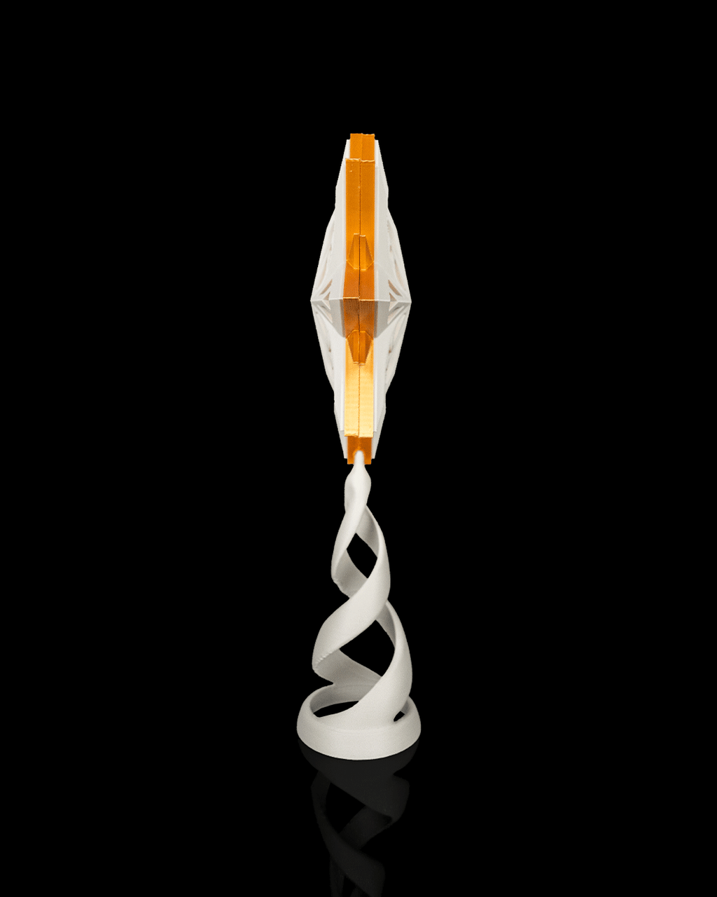 Edge view of the star topper and white spiral stand, on a black background