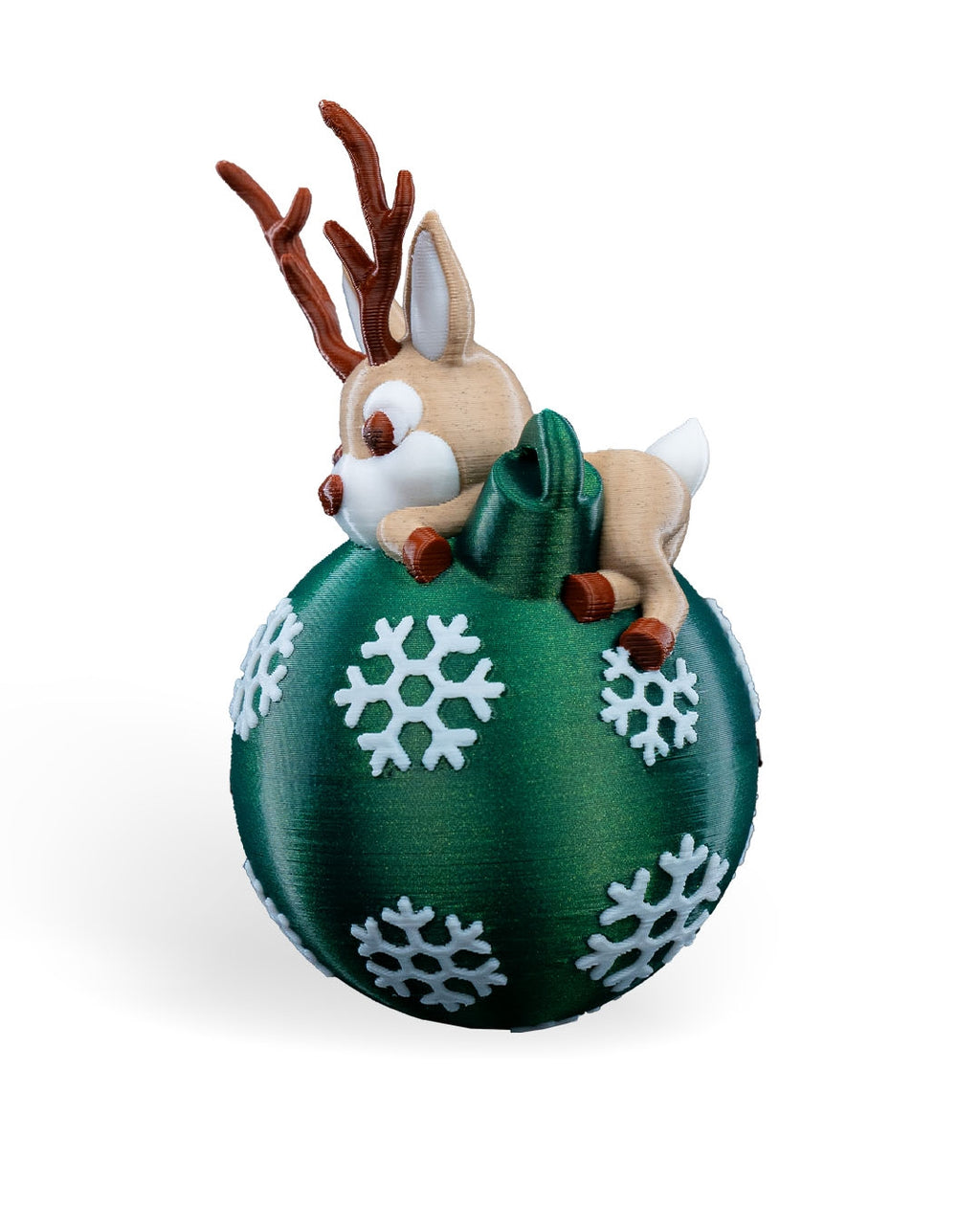 Lying Reindeer Christmas ornament turned to the side, showing the reindeer's legs and the green printed hanging loop, on a white background