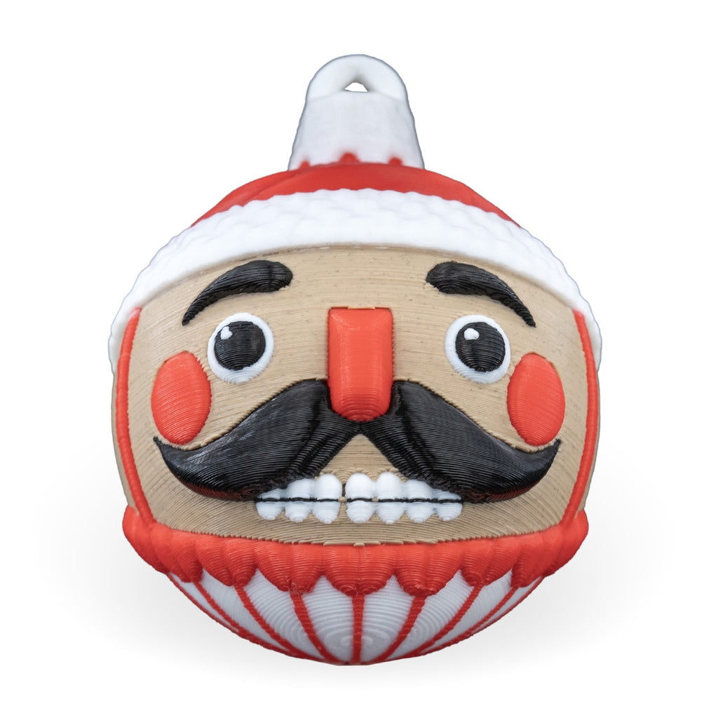 Nutcracker & Snowman Ornament 2-Pack: nutcracker Christmas ornament, front view: black mustache, red cheeks and printed loop, on a white background