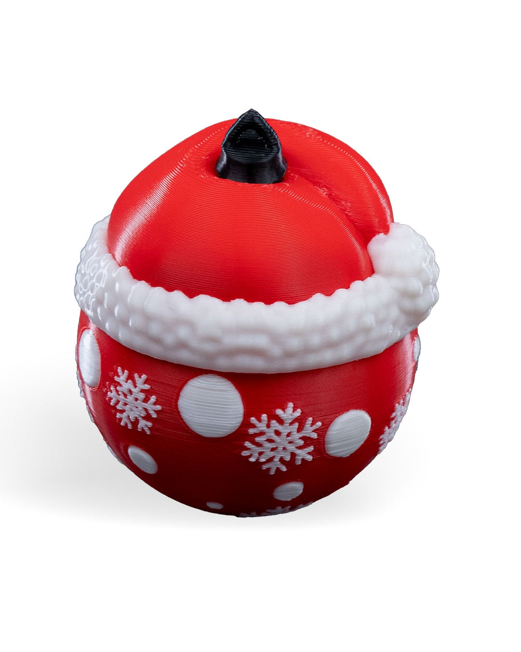 Back of the Santa Face Christmas ornament: red with white snowflakes and dots, with the printed hanging loop on top, on a white background