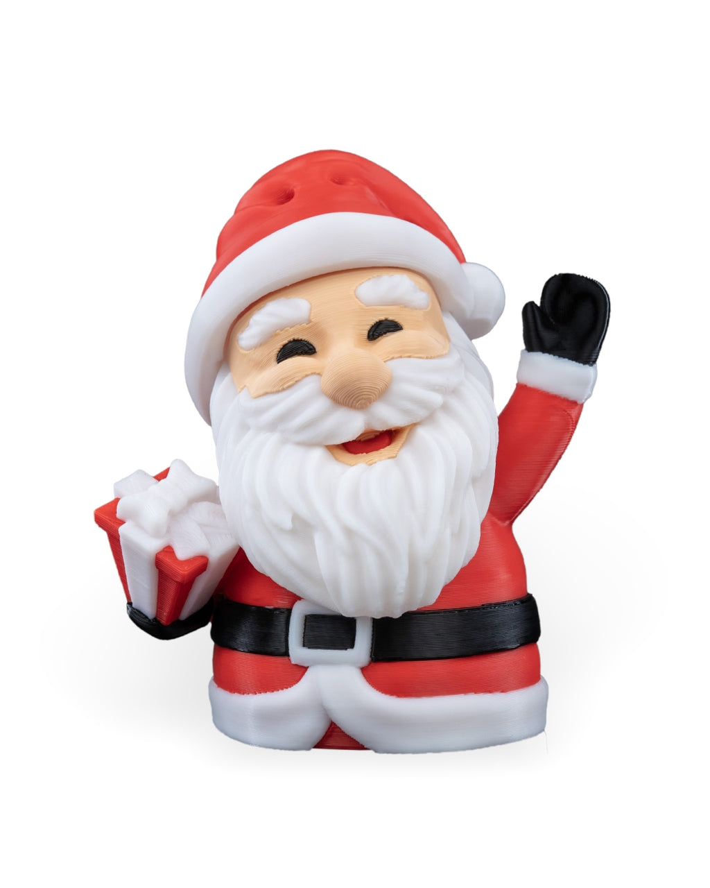 Waving Santa Christmas ornament, 3D printed, front view: red hat, white beard, black glove raised in a wave, holding a wrapped gift, on a white background